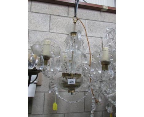 A 4 light glass chandelier