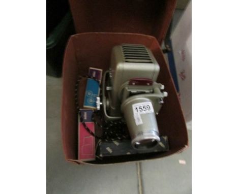 An Aldis projector in fibre case