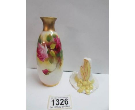 A Royal Worcester china works 'Georgian feather hat' candle snuffer and a Royal Worcester 'Roses' vase signed E Spilsbury, ci