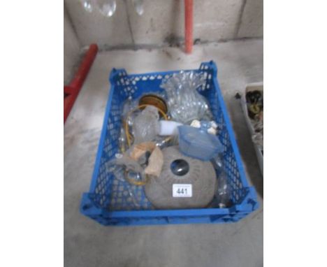 A box of chandelier parts