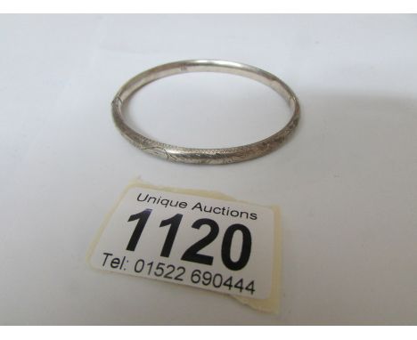 A silver bangle marked '925'