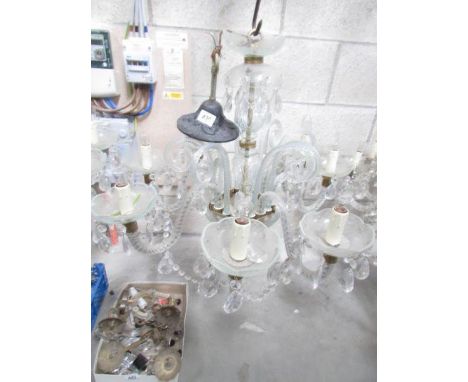 An 8 light glass chandelier