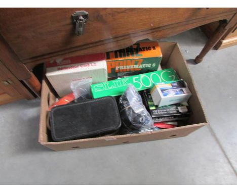 A large quantity of photographic accessories including tripod, exposure control, flashguns, straps etc.