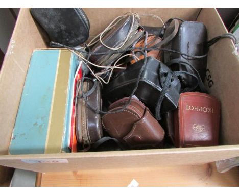 A box of light meters etc