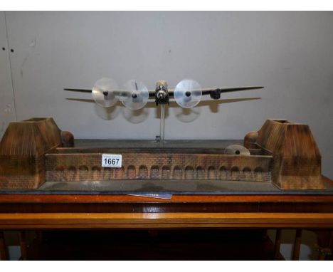 A model aeroplane on base