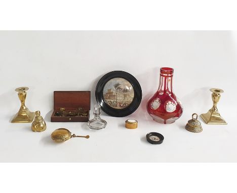 Prattware lid showing the Crystal Palace, within ebonised circular frame, pair of brass candlesticks, other brass collectable