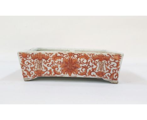 Chinese porcelain shallow dish, rectangular, painted in iron-red with chrysanthemums, scrolling leaves and Buddhist character