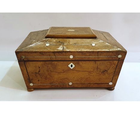 Sarcophagus-shaped fruitwood tea caddy with mother-of-pearl insets, raised on four bun feet, 16cm high 