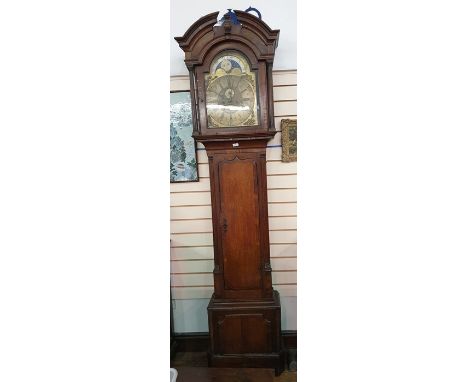 George III mahogany and oak longcase clock with broken arched pediment, the brass broken arched dial with painted moonphase t