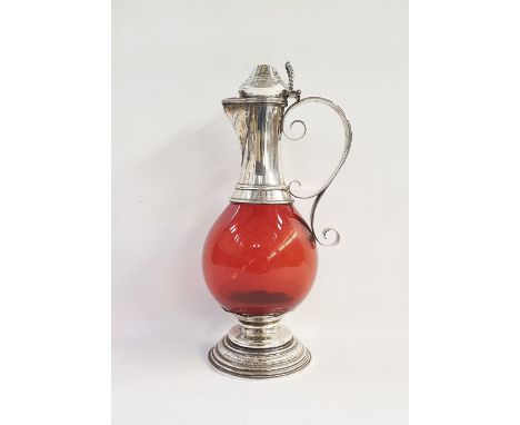Victorian silver Gothic claret jug with fleur de lys engraving, scrolled handle and ruby ( not cranberry) glass body, raised 