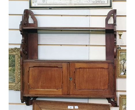 19th century mahogany wall-hanging shelf unit with two shelves and two cupboard doors, 60.5cm x 64cm 