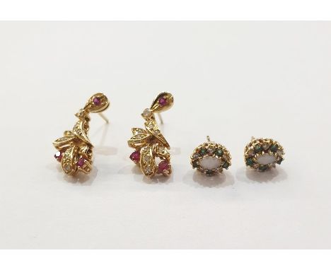 Pair gold coloured metal diamond and ruby foliate drop earrings and pair gold opal ,diamond and emerald stud earrings