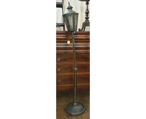 20th century brass standard lamp in the form of a Victorian street light, the six-glass shade on a turned brass column and ci