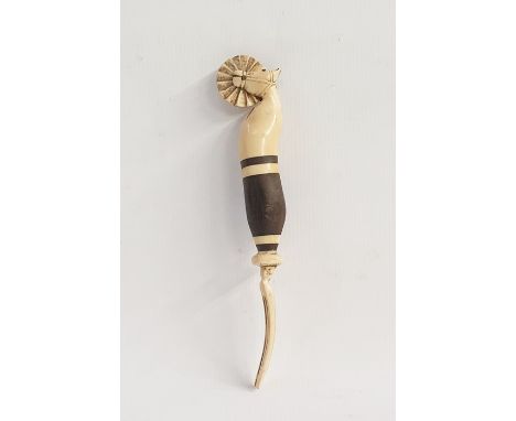 Carved bone and stained hardwood prisoner of war pastry jigger/fork decorated with a horse's head, 19cm long Condition Report