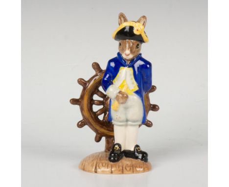 A captain aboard a ship wearing colonial clothing, standing next to the steering wheel and holding a spyglass. Part of the Sh