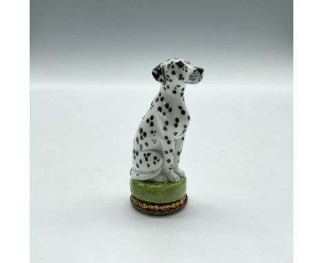 Hand painted dog figurine colored in black and white. HD backstamp. This item has its original box: 2.75"L x 3.75"W x 2.75"H.