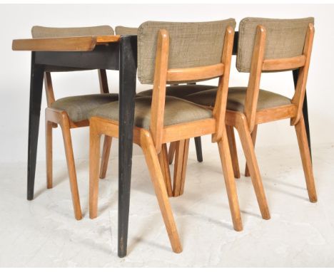 A retro vintage mid 20th Century teak wood topped extendable dining table of rectangular form, raised on ebonised angular tap