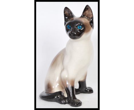 Winstanley - Kensington Pottery - A vintage retro 20th Century 1960's large ceramic figurine of a siamese cat model 32 having