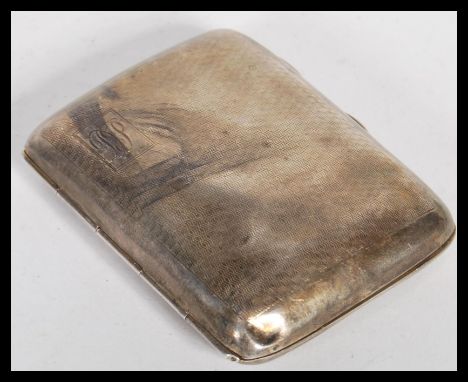 A mid 20th Century silver hallmarked cigarette case of rectangular form, having engine turned decoration to the exterior. Hal