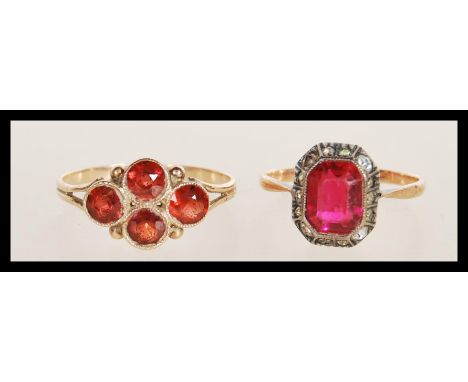 A stamped 9ct gold ring set with four round cut garnet stones (size P.5) along with a stamped 9ct gold and silver ring set wi