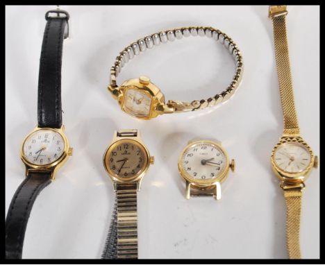 A selection of vintage 20th Century ladies cocktail watches to include three Timex watches and two Lorus watches, three havin