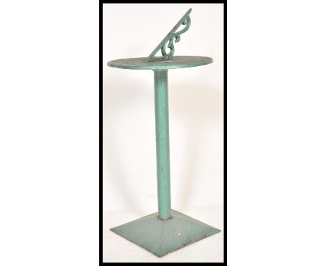 A vintage 20th Century antique style garden sundial table raised on square base with tubular column and circular sundial atop