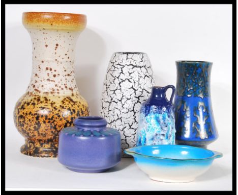 A group of vintage retro 20th Century West German studio pottery to include fat lava, flared neck baluster vase, bowl, crackl