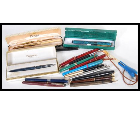 A collection of vintage 20th Century ink fountain pens to include Sheaffer, Parker, Waterman, Osmiroid, etc. some boxed, with