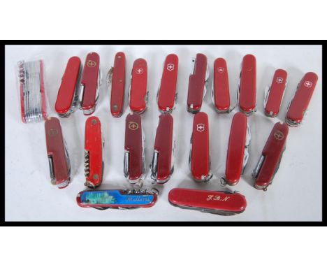 A collection of 20th Century pen knives / pocket knives to include a good selection of red Swiss Army type knives such as Vic