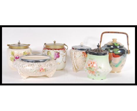 A collection of ceramic biscuit barrels dating from the early 20th Century to include Ivory blush ground example, green groun