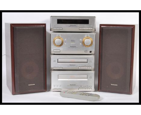 A 20th Century Technics separates stacking music system consisting of CD player, radio receiver, amplifier, speakers etc&nbsp