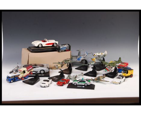 A collection of assorted loose scale diecast model motor vehicles and planes to include; Mira 1:18 Ford Mustang, Bburago 1:24