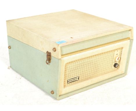 A vintage retro mid 20th century Dansette Bermuda four speed record player having a twin dial Monarch deck set in a two tone 