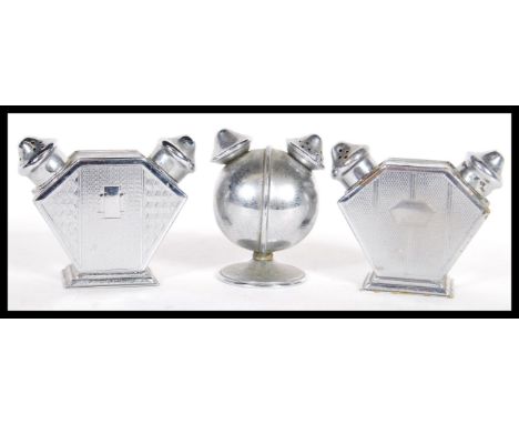 A group of three vintage early 20th Century art deco double dual condiment shakers consisting of a bear pair of engine turned