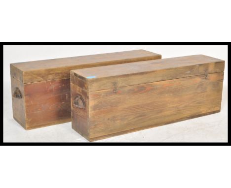 A pair of vintage early 20th Century wooden Lord Roberts ammunition crates having hinged lids with shaped brass handles. Meas