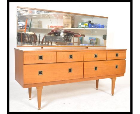 A vintage retro 20th Century teak wood dressing table having large rectangular mirror back in the manner of Mogens Kolo.&nbsp