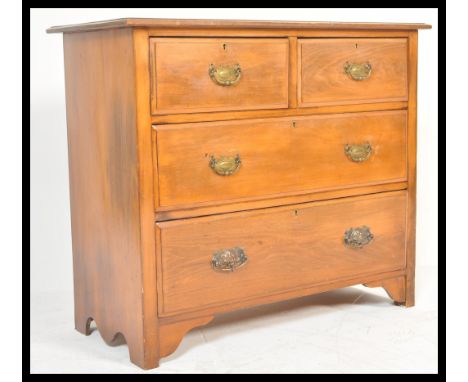A late 19th Century Victorian mahogany&nbsp; two over two chest of drawers with shaped swing handles and locks to each, raise