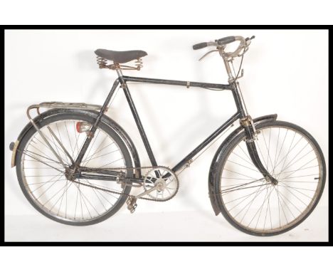 A vintage early 20th Century gents sit up and beg bike from The Hercules Cycle &amp; Motor Co Ltd. With bell and later Sturme