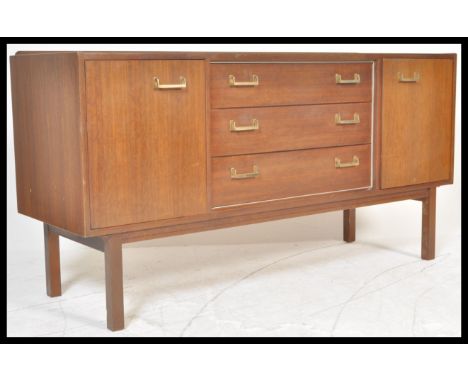 A vintage retro teak mid 20th Century sideboard, cupboard either side and a bank of 3 central drawers with square brass handl