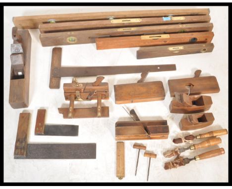 A good collection of vintage 20th Century wood working tools to include a selection of plains, saws etc.