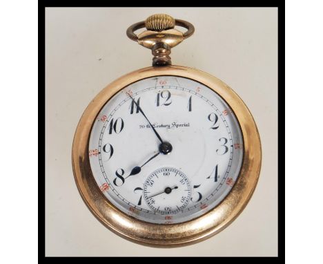 A gold plated 20th Century Special pocket watch having an open face with a white enamelled dial with arabic numerals to the c