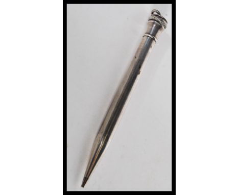 A vintage 20th Century sterling silver Wahl Eversharp USA American propelling pencil having an engine turned design with bale