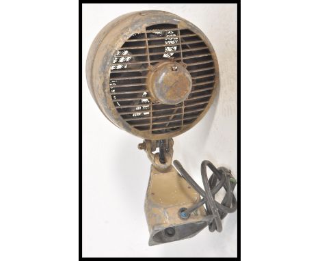 A vintage mid 20th Century industrial factory wall heater by GEC, the adjustable directional heater retaining wall mountings&