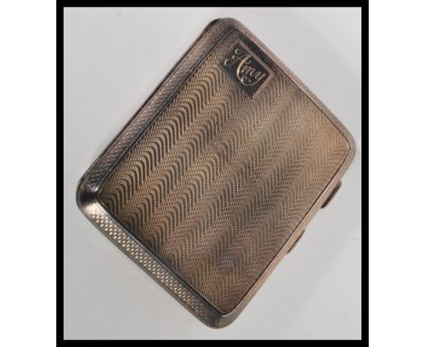 An early 20th Century hallmarked silver cigarette case by E J Trevitt &amp; Sons of rectangular form having engine turned dec