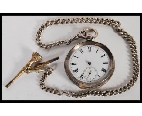 A 19th Century Victorian hallmarked silver pocket watch complete with silver albert chain and yellow metal bloodstone agate s