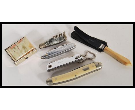 A collection of vintage penknives to include IXL George Wostenolm Sheffield folding pen knife, a celluloid cased cork screw, 