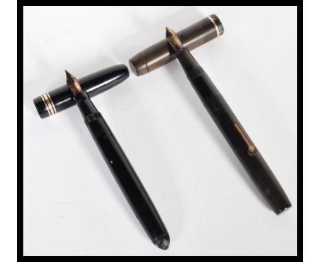 A vintage 20th Century Mabie Todd Swan fountain ink pen with a 14ct gold nib together with a Conway Stewart lever fill ink pe