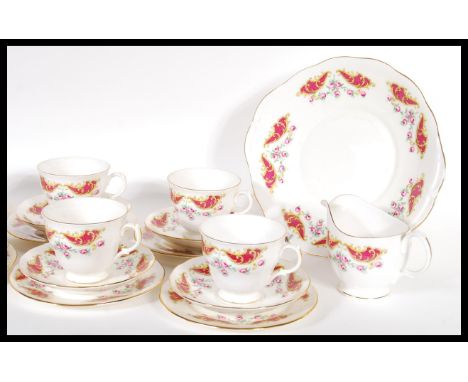 A vintage 20th Century Gainsborough English fine bone china tea service in the manner of Royal Albert consisting of six cup s