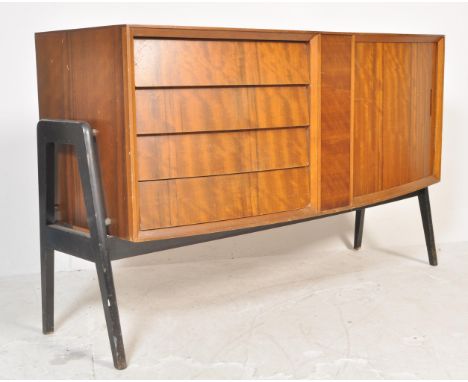 A vintage mid 20th Century bow fronted teak wood - tola wood sideboard / credenza, a bank of three drawers flanked to the rig