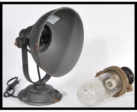 A pair of matching 20th Century Industrial style spotlights together with a vintage 20th Century Dairy light. Tallest measure